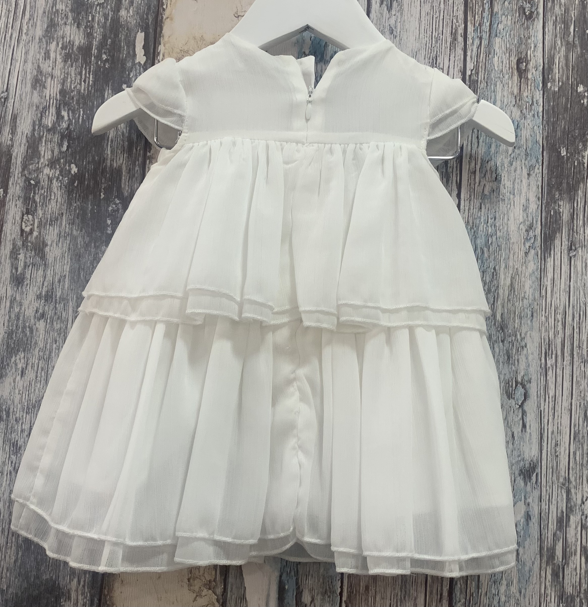 VESTIDO VOLANTES BEBÉ CON BRAGUITA